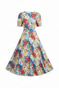 Women's floral print A-line midi dress with colorful flower pattern on white background